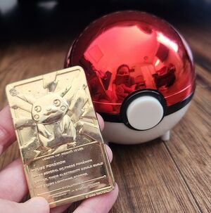 1999 Burger King Poké Ball with 23k Gold-Plated Pikachu Card